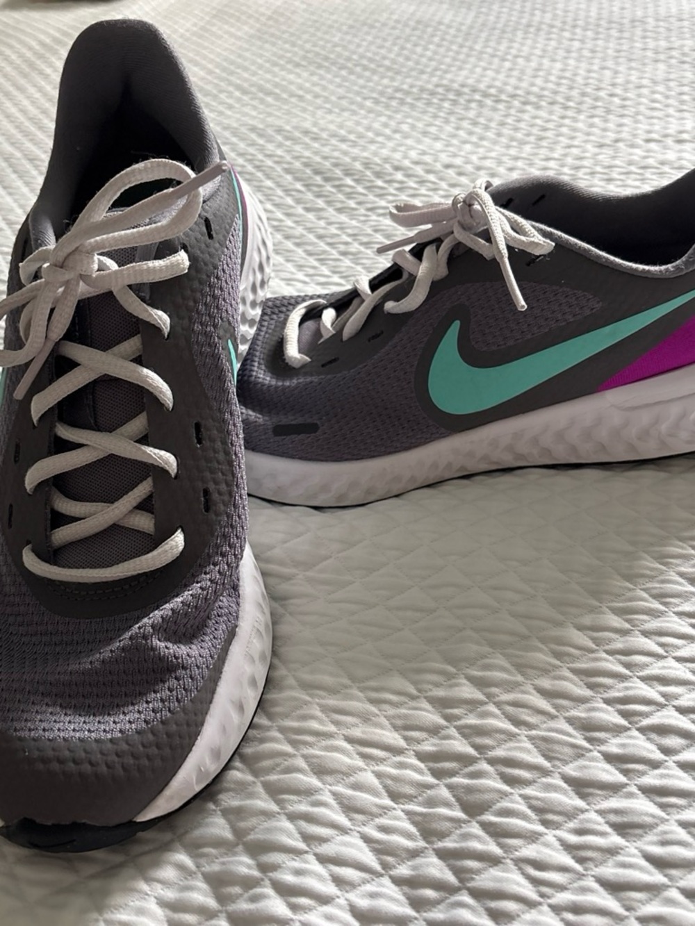 Nike Women’s Gray Athletic Shoes with Teal Swoosh and Purple Accent